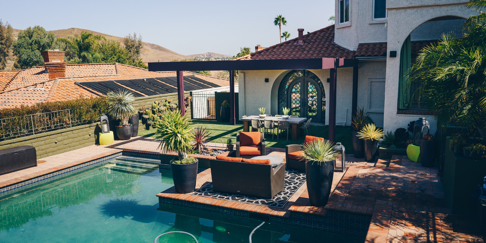 Inspiration for an eclectic pool in Orange County.