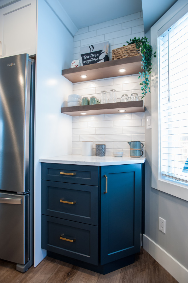 Example of a transitional kitchen design in Edmonton