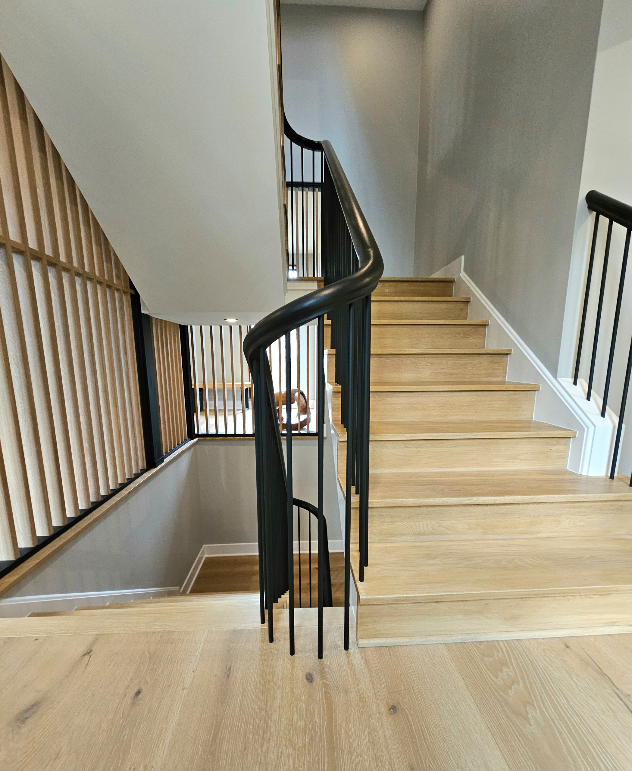 115_Stunning Continuous Rail System on 3 Story Floating Stairs; Arlington, VA 22