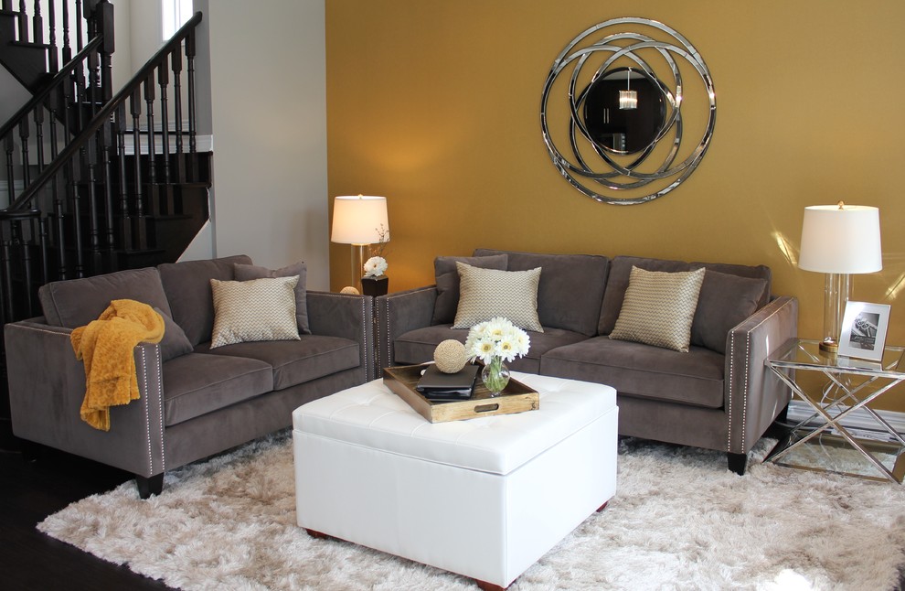Inspiration for a mid-sized transitional open concept family room in Toronto with dark hardwood floors.