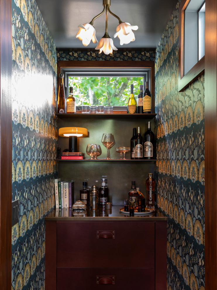 Example of a transitional home bar design in Austin