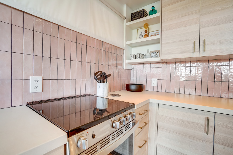 Inspiration for a small midcentury l-shaped eat-in kitchen in Other with an undermount sink, flat-panel cabinets, light wood cabinets, quartz benchtops, pink splashback, ceramic splashback, stainless steel appliances, concrete floors, no island, grey floor, grey benchtop and exposed beam.