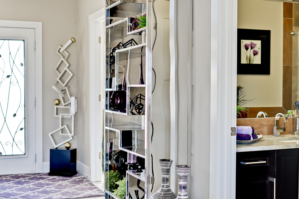 Foyer - large transitional marble floor foyer idea in Edmonton with gray walls and a white front door