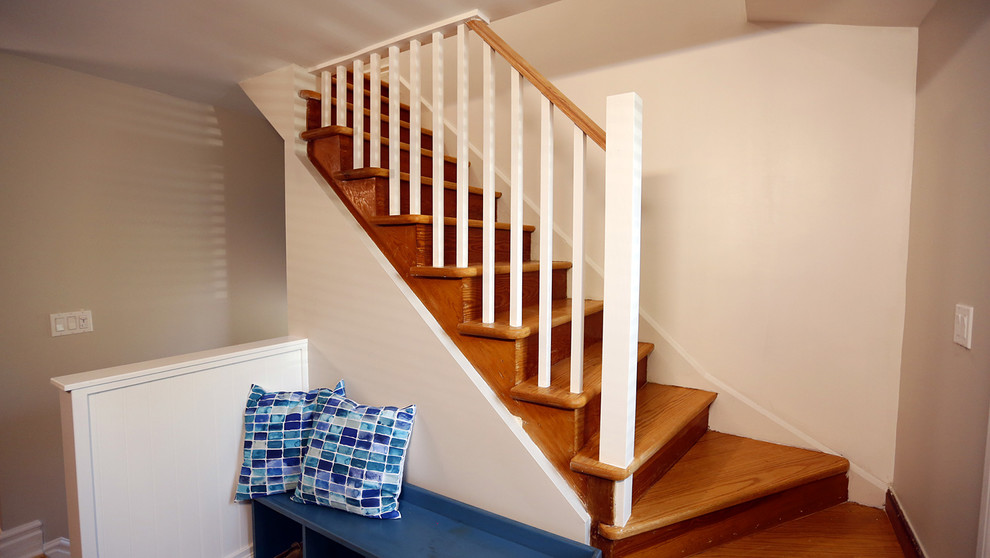 Small transitional ceramic tile staircase photo in Toronto with beige walls