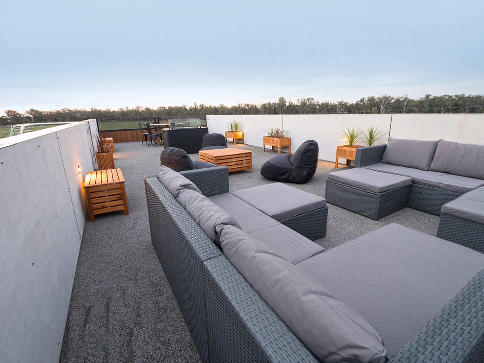 Design ideas for a large contemporary rooftop deck in Other.