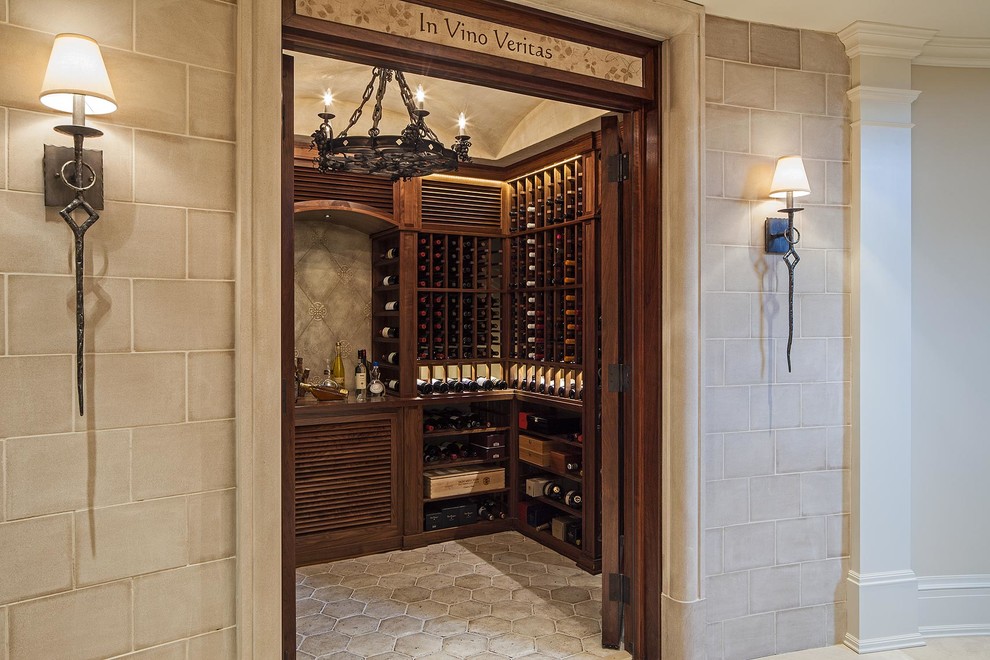 This is an example of a traditional wine cellar in Toronto with storage racks and grey floor.