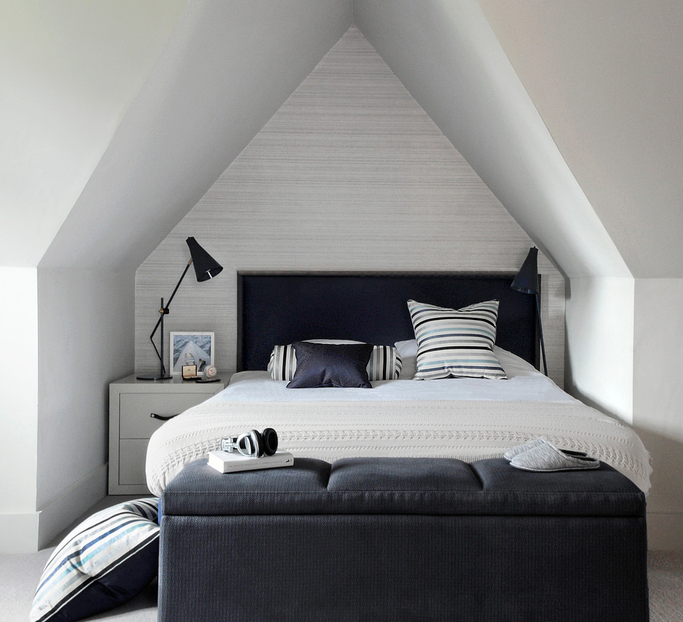 Small contemporary guest bedroom in London with grey walls, carpet and no fireplace.