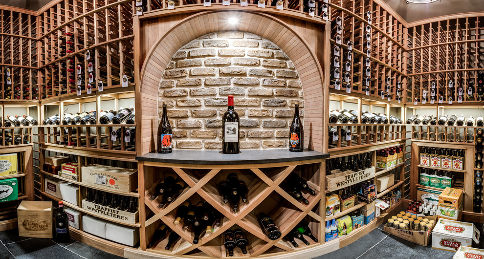 Photo of a large classic wine cellar in DC Metro with ceramic flooring and storage racks.