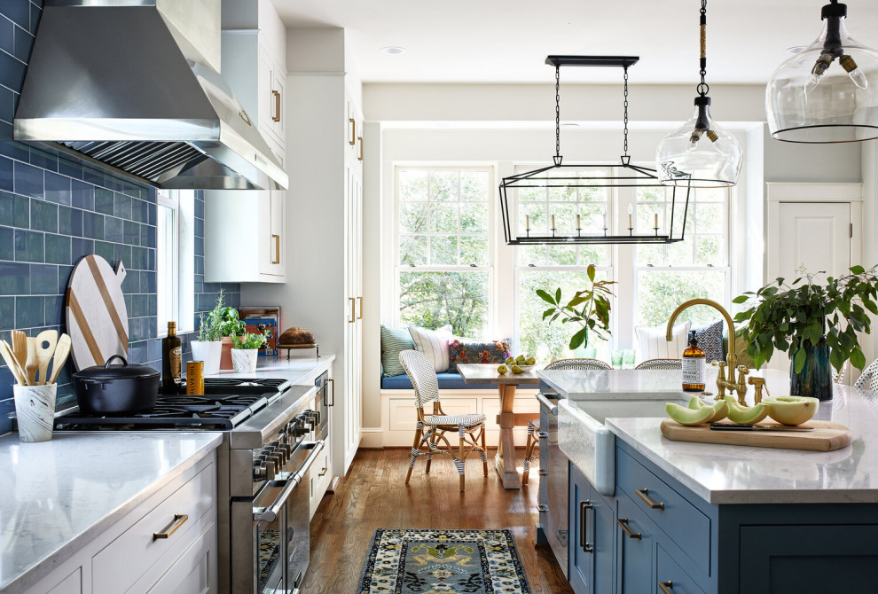Eat-in kitchen - mid-sized contemporary l-shaped medium tone wood floor eat-in kitchen idea in Tampa with an undermount sink, shaker cabinets, turquoise cabinets, quartz countertops, stainless steel appliances, an island and white countertops