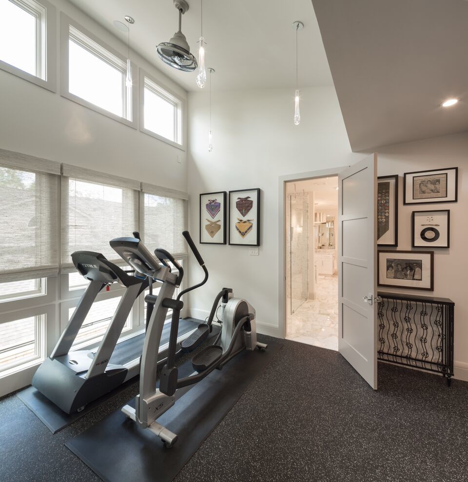 This is an example of a transitional multipurpose gym in Little Rock with white walls.