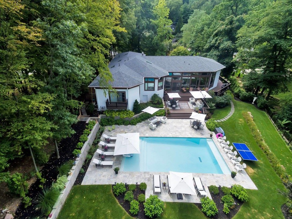 Inspiration for an expansive transitional pool in New York.