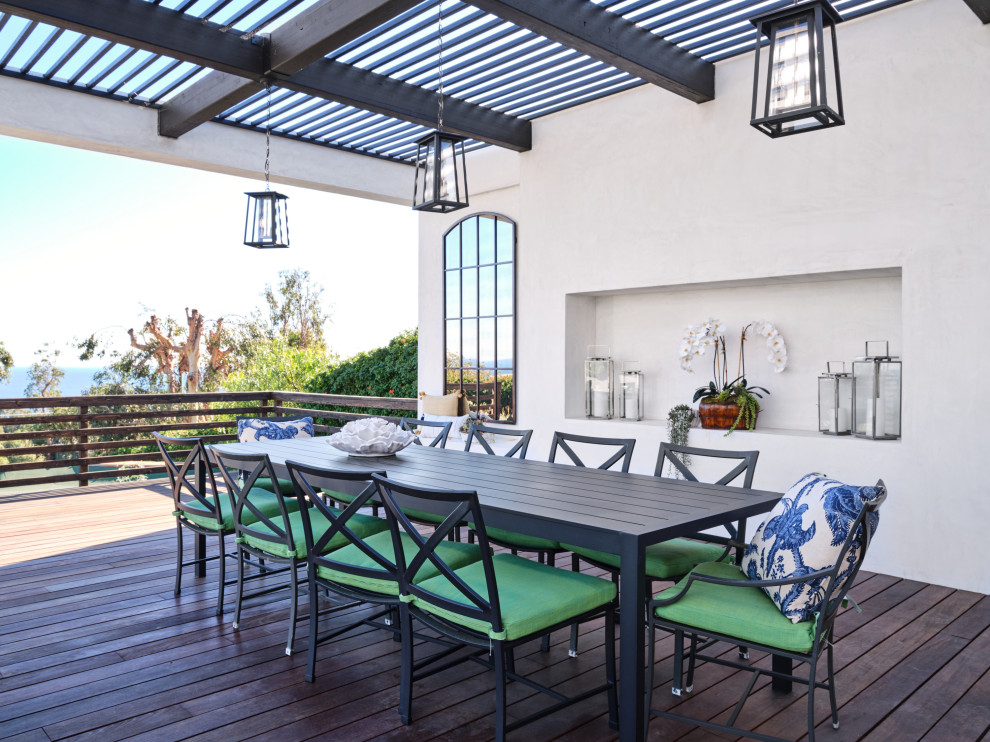Covered Outdoor Dining Area with Pergola and Coastal Views - Beach ...
