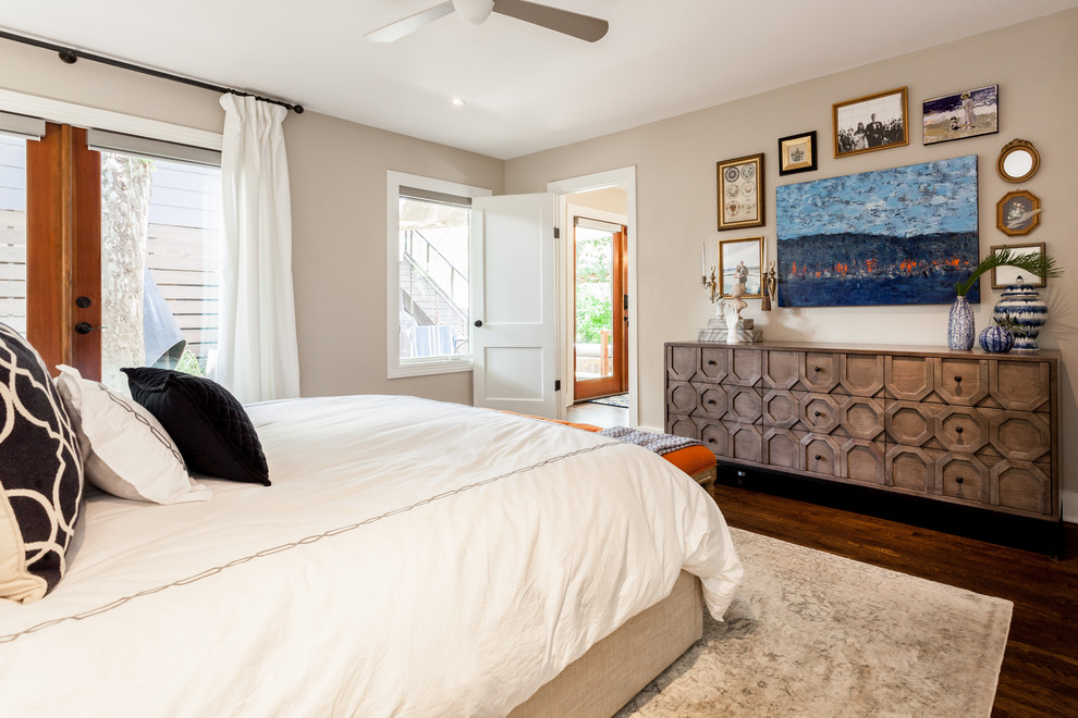Design ideas for an eclectic bedroom in New Orleans with grey walls and dark hardwood floors.