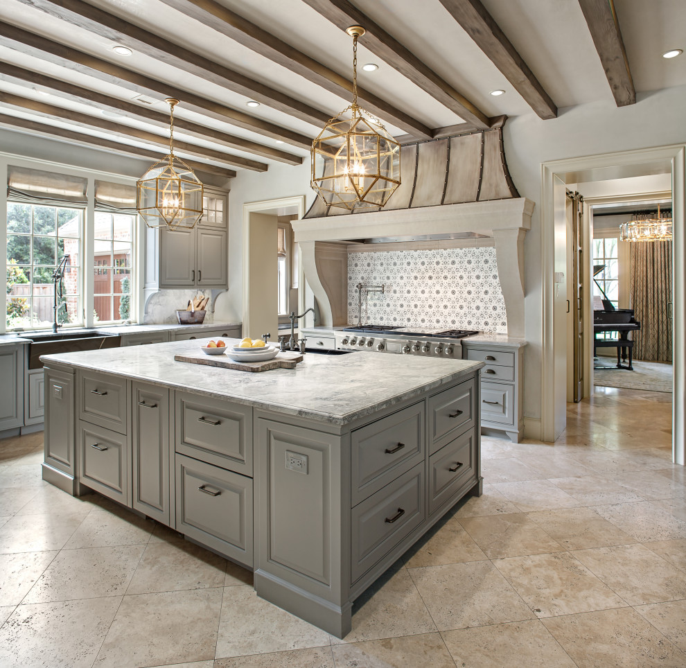 Mid-sized transitional u-shaped separate kitchen in Houston with a farmhouse sink, beaded inset cabinets, grey cabinets, quartzite benchtops, grey splashback, stone tile splashback, panelled appliances, travertine floors, with island, beige floor and grey benchtop.