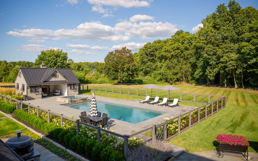 Inspiration for a mid-sized stone and rectangular pool remodel in Boston