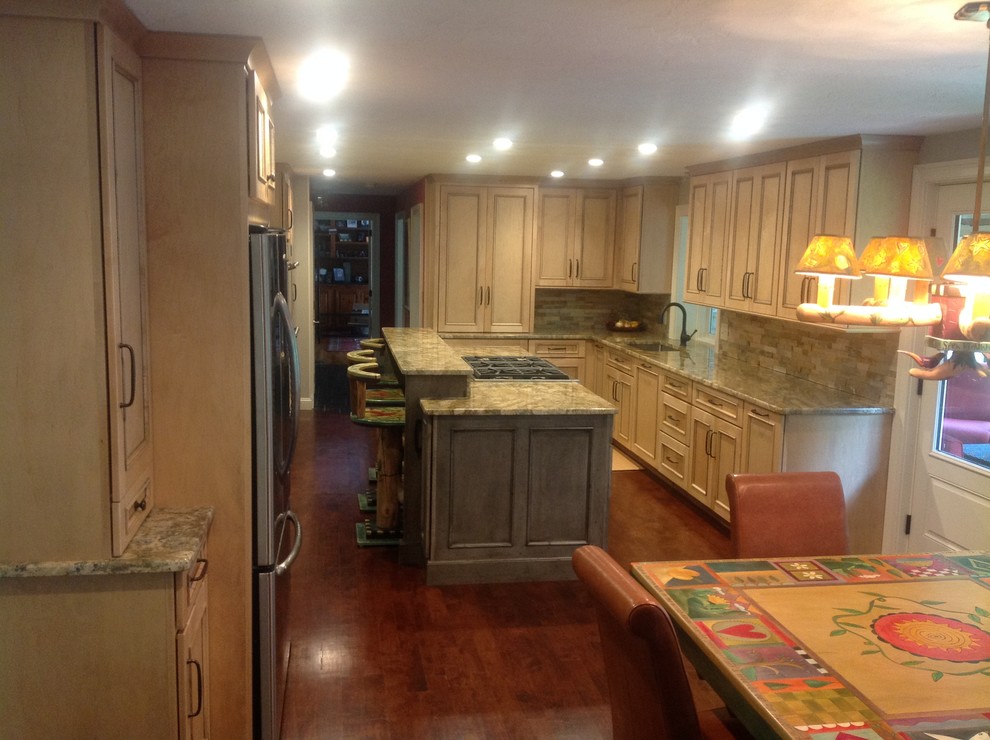 Mountain style home design photo with granite countertops