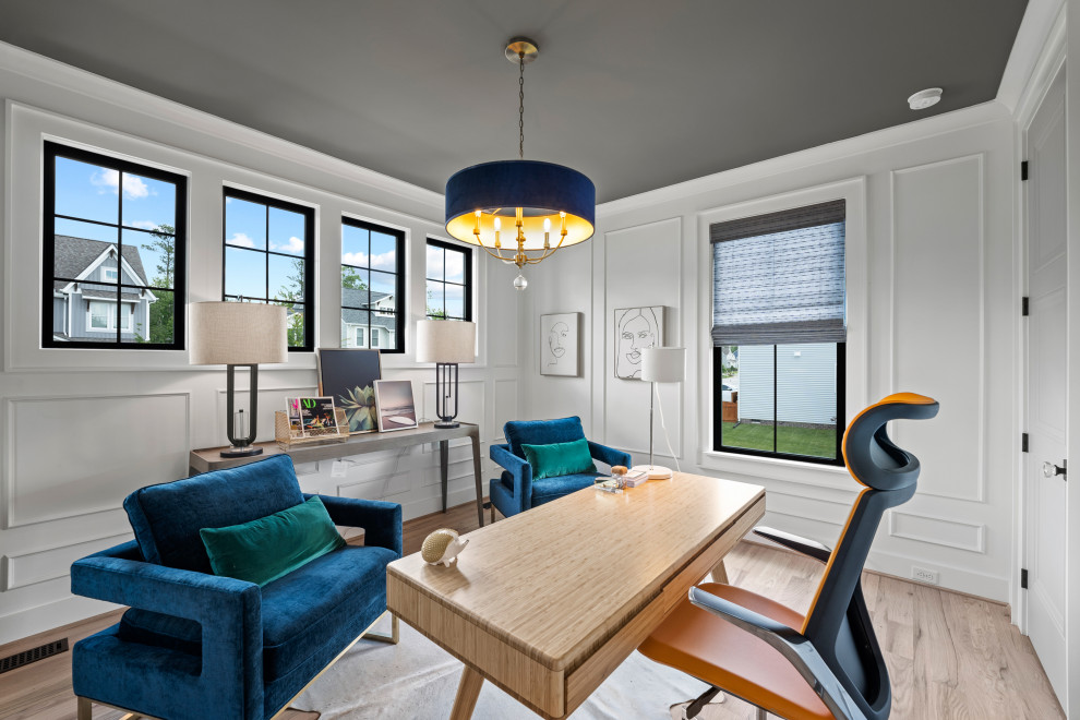 The Cardinal - Study room - mid-sized transitional freestanding desk light wood floor, beige floor and wall paneling study room idea in Richmond with white walls and no fireplace