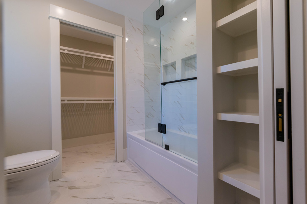Photo of a medium sized rural shower room bathroom in Miami with freestanding cabinets, distressed cabinets, a built-in bath, a two-piece toilet, white tiles, porcelain tiles, grey walls, porcelain flooring, a vessel sink, white floors, a sliding door, a single sink, a freestanding vanity unit and a shower/bath combination.