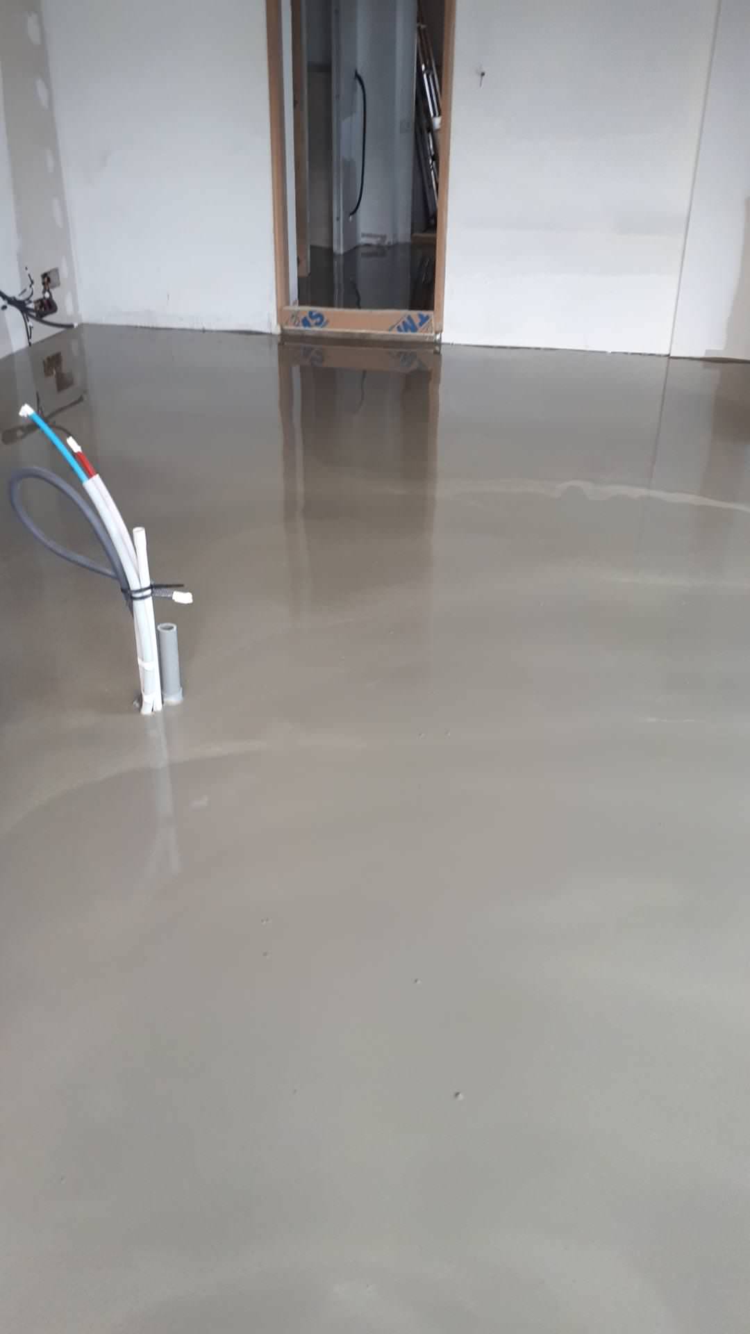 Transformation d'une chambre parentale en pièce de vie/cuisine