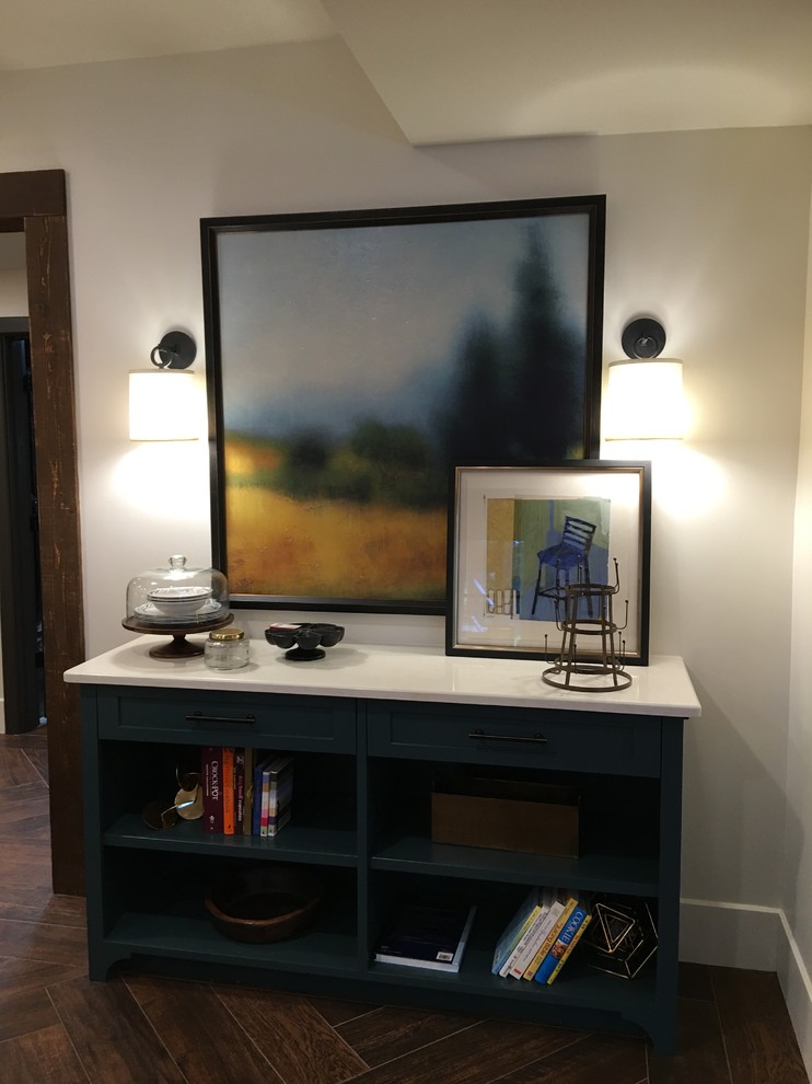 Example of a mid-sized transitional walk-out dark wood floor hallway design in Atlanta with gray walls