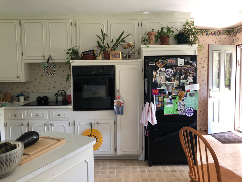 Inspiration for a small transitional u-shaped vinyl floor and gray floor eat-in kitchen remodel in Milwaukee with a double-bowl sink, shaker cabinets, white cabinets, granite countertops, gray backsplash, glass tile backsplash, stainless steel appliances, a peninsula and gray countertops