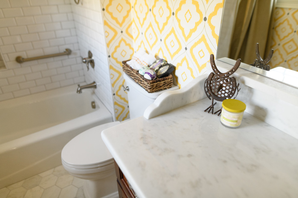 Alcove bathtub - mid-sized transitional 3/4 white tile and subway tile marble floor and white floor alcove bathtub idea with dark wood cabinets, a two-piece toilet, multicolored walls, quartzite countertops and white countertops