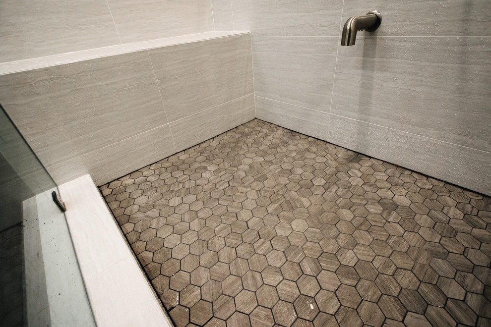 Large contemporary 3/4 bathroom in Los Angeles with flat-panel cabinets, medium wood cabinets, an alcove shower, gray tile, porcelain tile, white walls, porcelain floors, an undermount sink, engineered quartz benchtops, brown floor and a shower curtain.