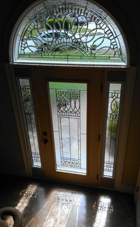 Front door - large transitional front door idea in Atlanta with a dark wood front door
