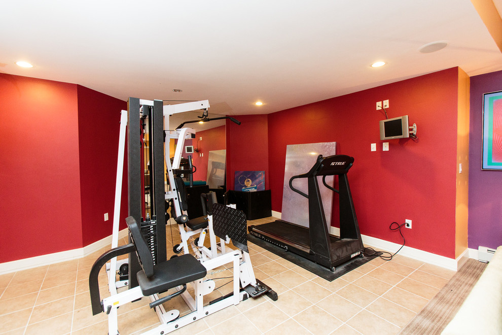 Inspiration for a mid-sized contemporary home weight room in Boston with red walls and ceramic floors.