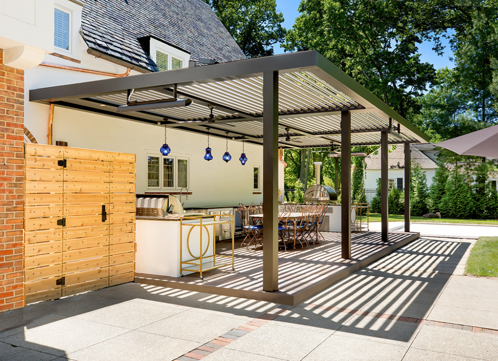 Inspiration for a large transitional backyard deck in Columbus with an outdoor kitchen and a pergola.