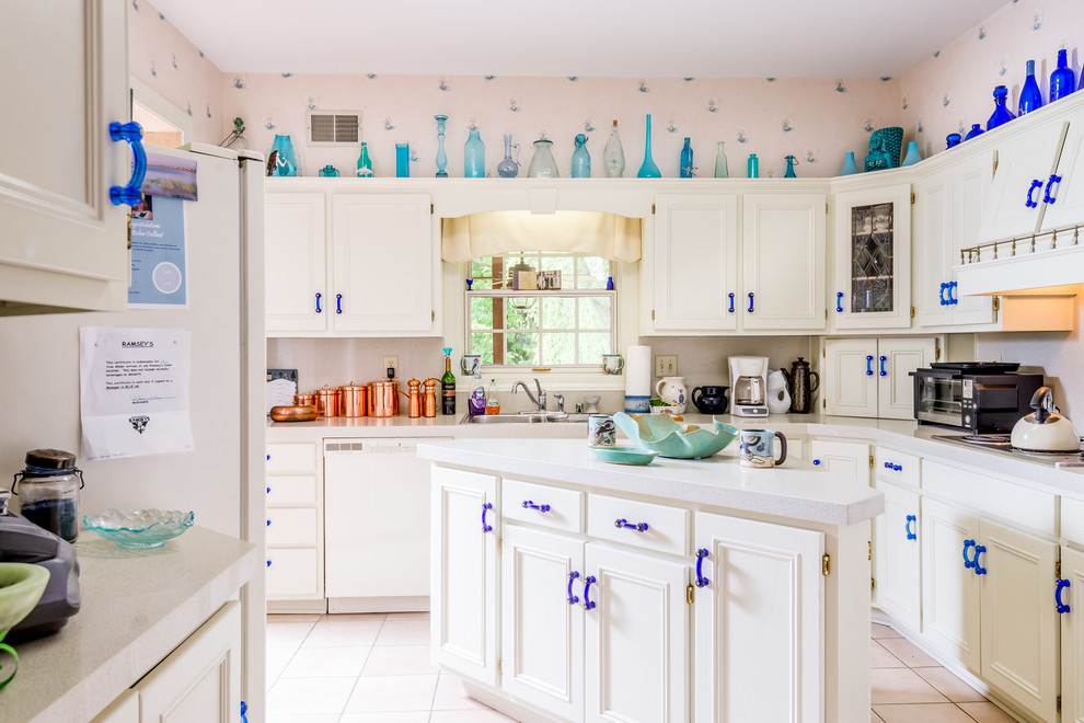 This is an example of an eclectic separate kitchen in Other with a double-bowl sink, recessed-panel cabinets, white cabinets, beige splashback, white appliances, ceramic floors and with island.