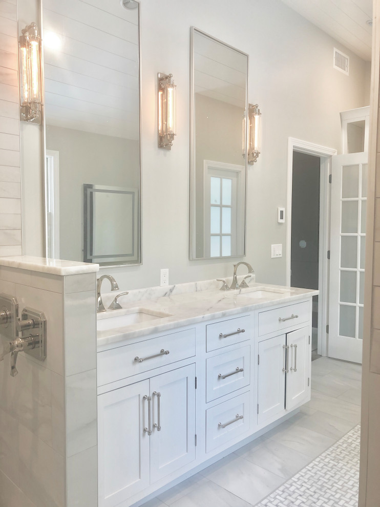 Design ideas for a large classic ensuite bathroom in Boston with shaker cabinets, white cabinets, a walk-in shower, a bidet, grey walls, marble worktops, a hinged door, grey worktops, a shower bench, double sinks, a freestanding vanity unit, a vaulted ceiling and tongue and groove walls.