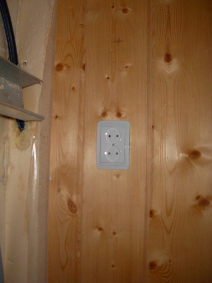 Скрытая электропроводка в деревянном доме из бруса