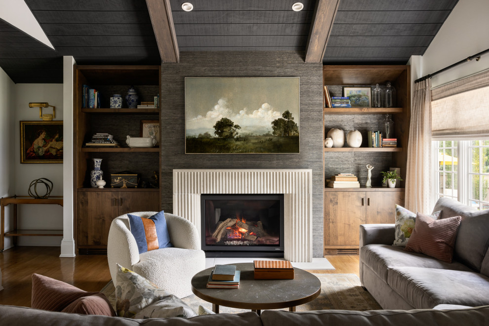 Family room - large traditional open concept medium tone wood floor, shiplap ceiling and wallpaper family room idea in New York with a standard fireplace, a stone fireplace and a wall-mounted tv