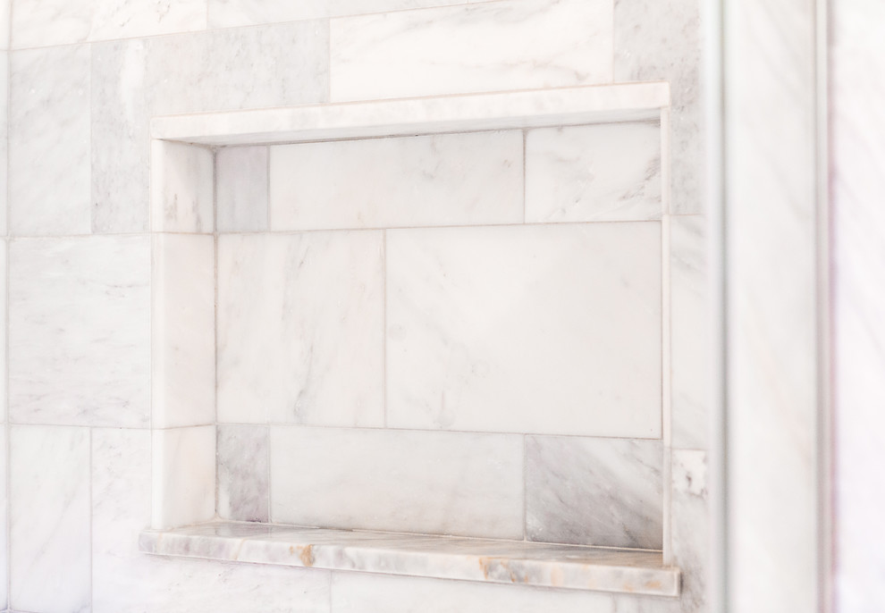 Example of a transitional home design design in Boston