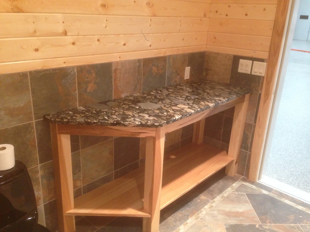 Large mountain style bathroom photo with open cabinets, light wood cabinets and granite countertops