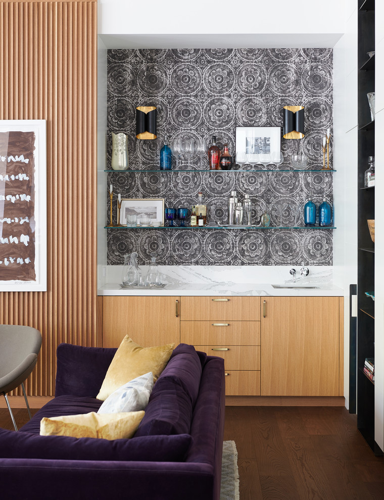 Inspiration for a contemporary single-wall wet bar in Toronto with an undermount sink, flat-panel cabinets, light wood cabinets, multi-coloured splashback, dark hardwood floors and multi-coloured benchtop.