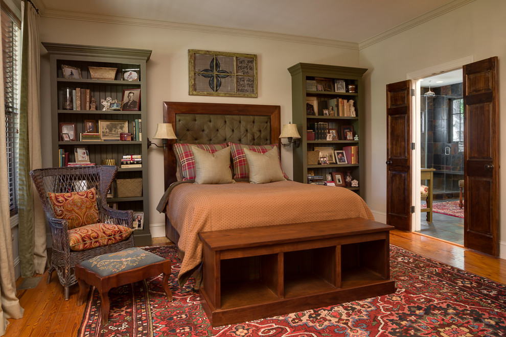 Photo of a mid-sized country master bedroom in Louisville with beige walls, dark hardwood floors and no fireplace.