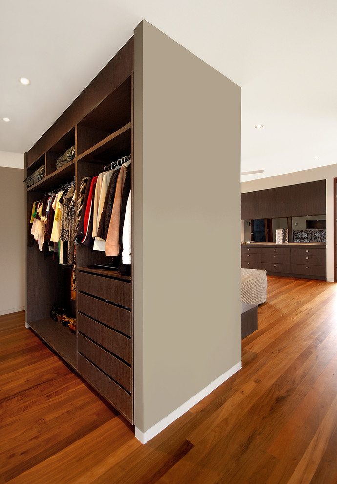 This is an example of a contemporary storage and wardrobe in Sunshine Coast.