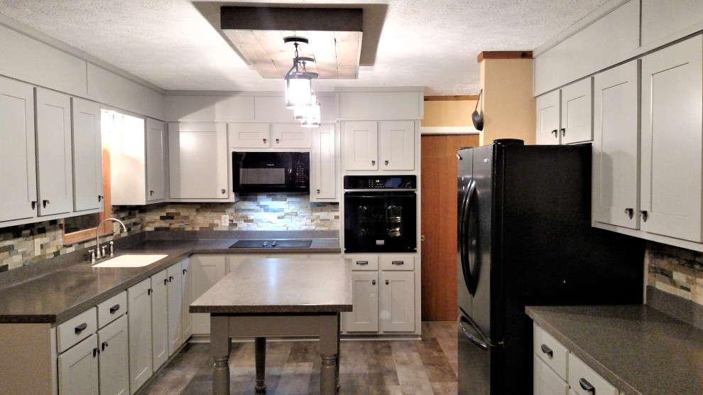 Example of a mountain style kitchen design in Atlanta