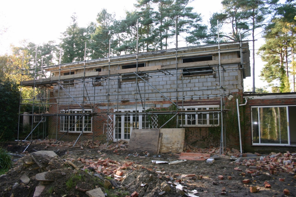 Project has started - stripping outer skin of bricks . Retaining blockwork