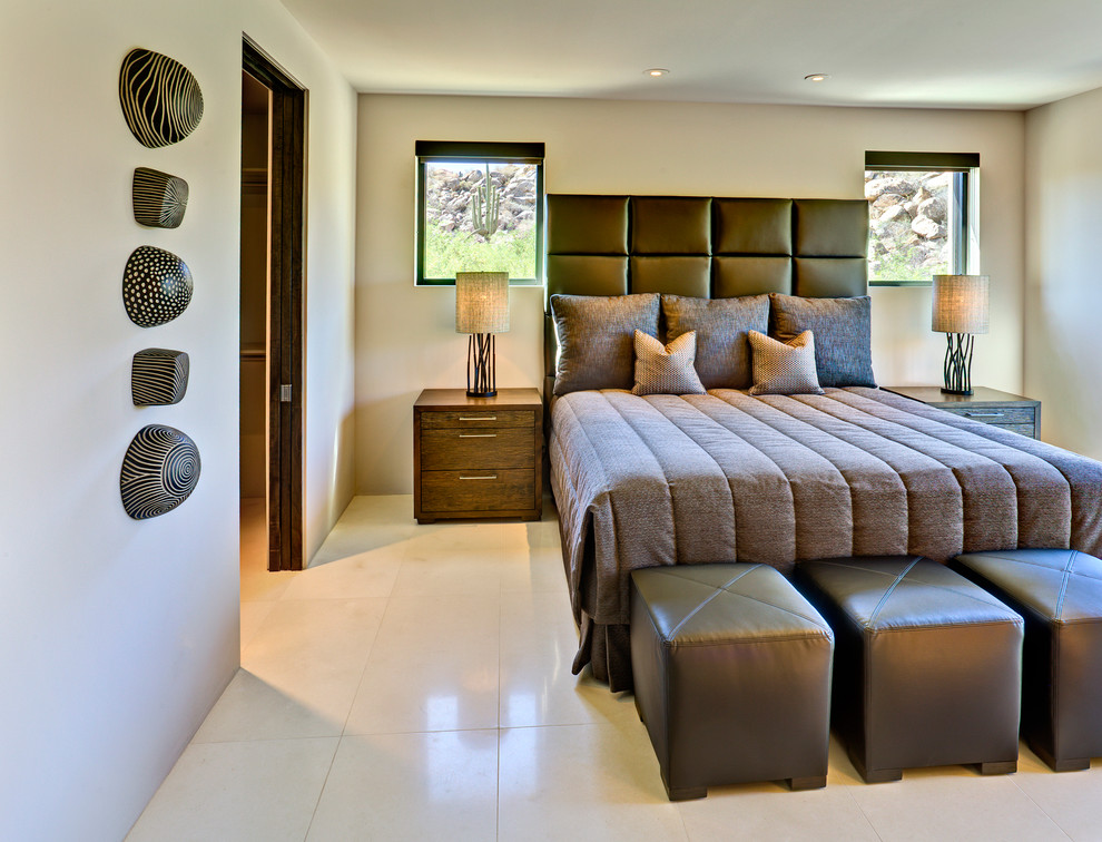 Mid-sized contemporary bedroom in Phoenix with white walls.