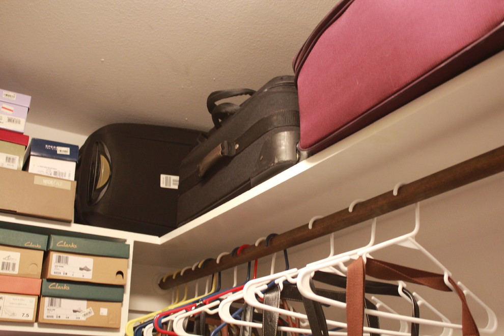 Example of a transitional closet design in Houston
