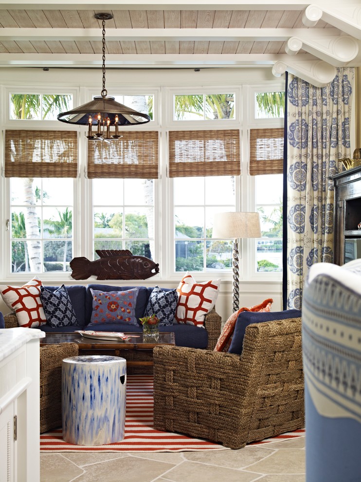 Beach style living room photo in Miami with white walls