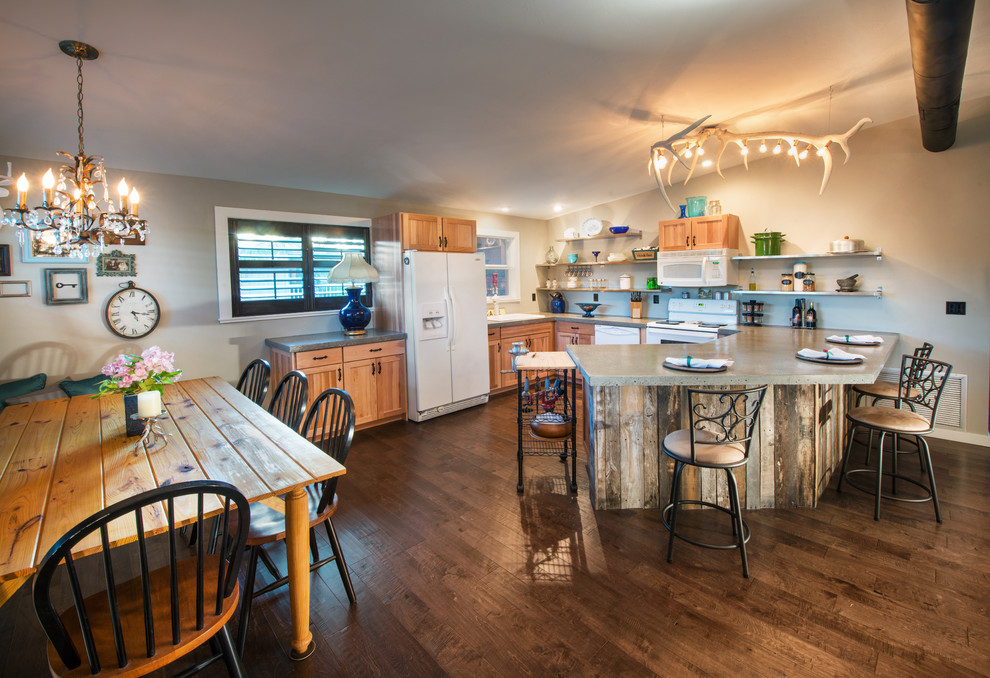 This is an example of a mid-sized country kitchen in Miami.