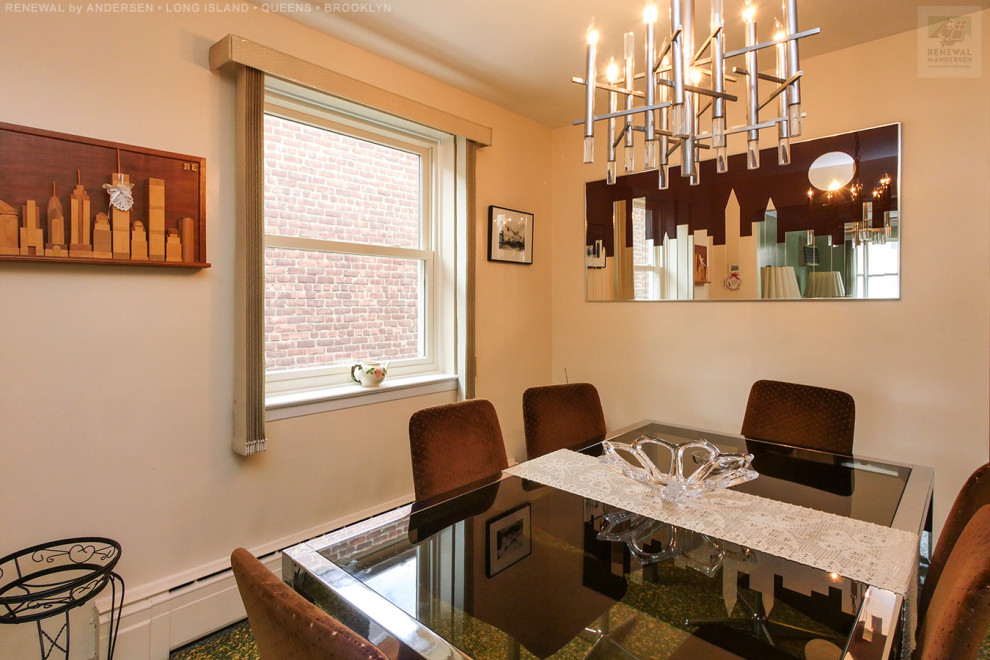 Mid-sized dining room in New York with beige walls, laminate floors, no fireplace and green floor.
