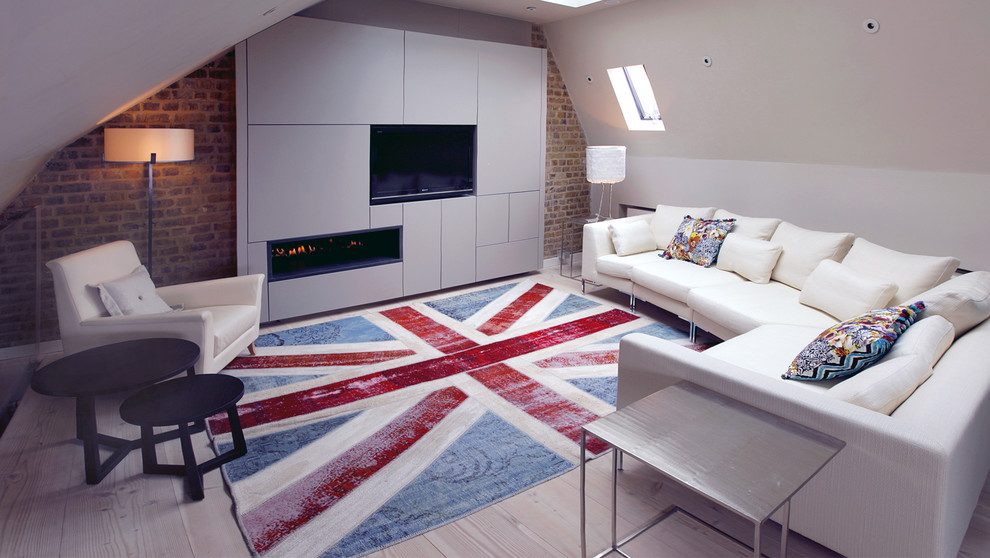 Photo of a contemporary family room in London.