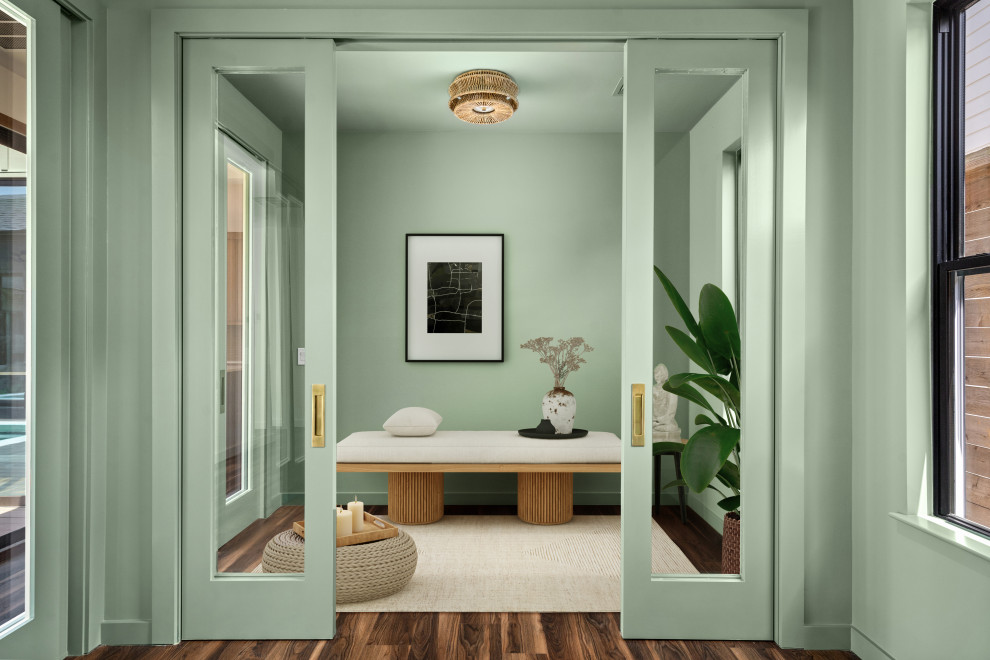 Mid-century modern home office photo in Houston