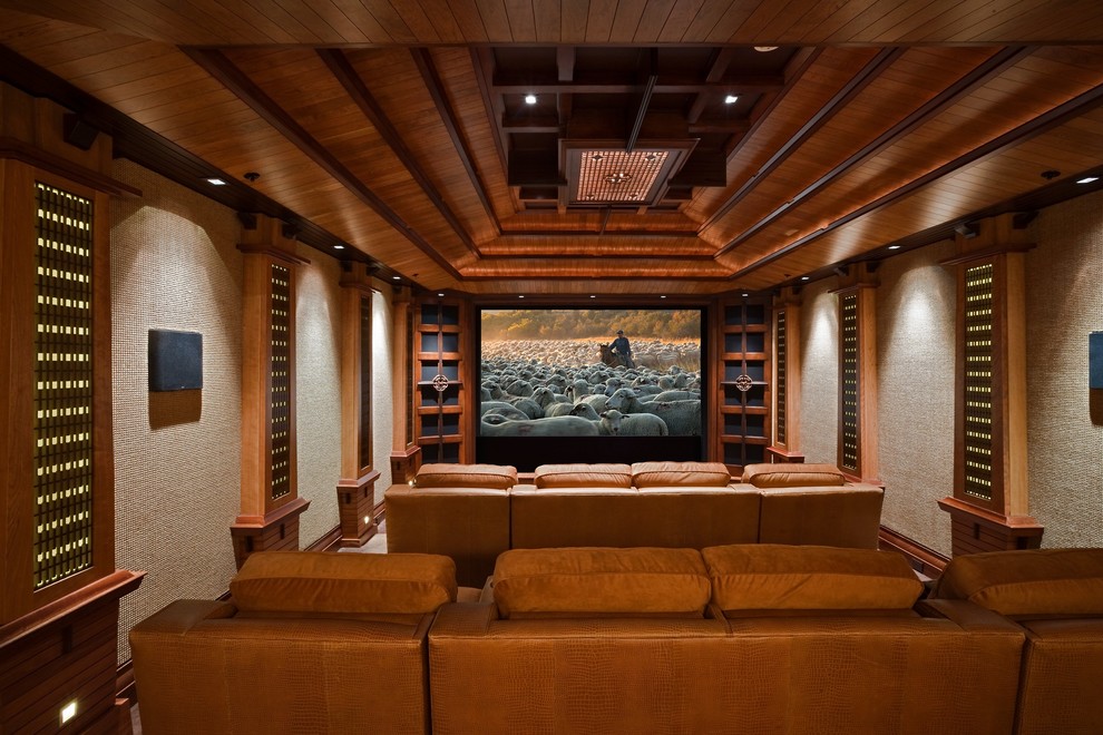 Large traditional enclosed home theatre in Albuquerque with a projector screen.
