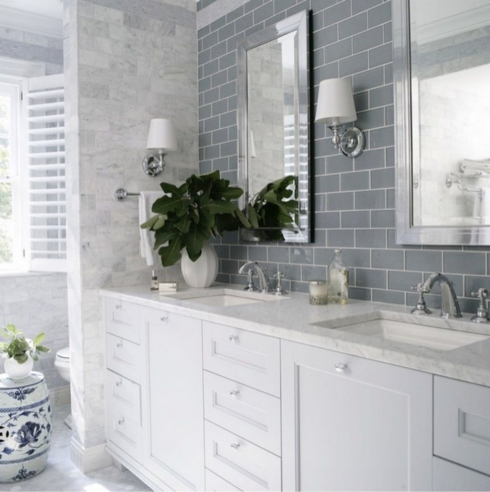 Bathroom - large transitional master gray tile and subway tile mosaic tile floor and gray floor bathroom idea with recessed-panel cabinets, white cabinets, gray walls, an undermount sink and solid surface countertops